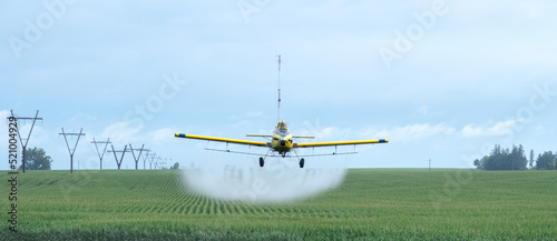 Aerial Applicator Dusting Crops in the Midwest