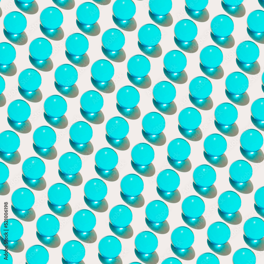 Shiny and glossy abstract background with blue spheres on white.