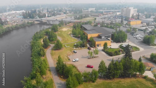4K Drone Video of Morris Thompson Cultural Center on the Chena River in Downtown Fairbanks, Alaska on Summer Day photo