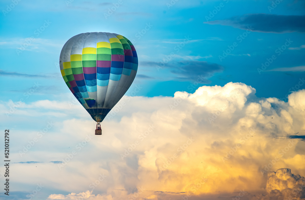 Fototapeta premium Air balloon in the beautiful sky with clouds.
