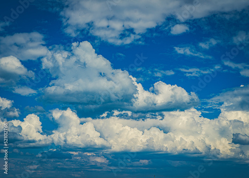 Beautiful nature background. Blue sky with white clouds. © Aleks Kend