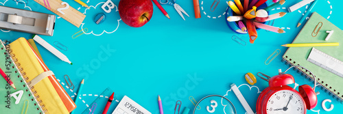 Fotografie Back to school concept with school equipment and copy space on blue background 3