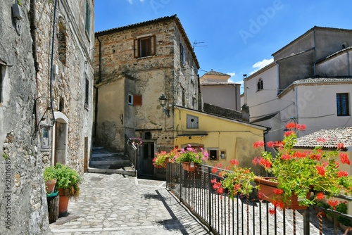 Fototapeta Naklejka Na Ścianę i Meble -  A small street between the old houses of Zungoli, one of the most beautiful villages in Italy.