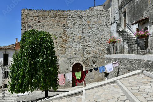 Fototapeta Naklejka Na Ścianę i Meble -  A small street between the old houses of Zungoli, one of the most beautiful villages in Italy.