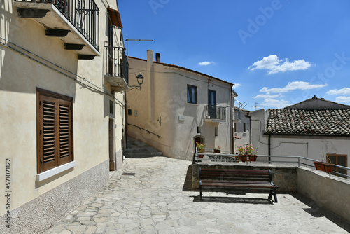 Fototapeta Naklejka Na Ścianę i Meble -  A small street between the old houses of Zungoli, one of the most beautiful villages in Italy.