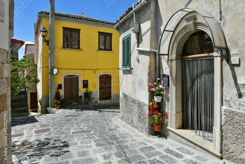 Fototapeta Naklejka Na Ścianę i Meble -  A small street between the old houses of Zungoli, one of the most beautiful villages in Italy.