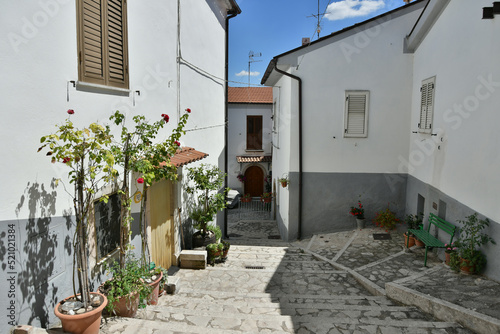 Fototapeta Naklejka Na Ścianę i Meble -  A small street between the old houses of Zungoli, one of the most beautiful villages in Italy.