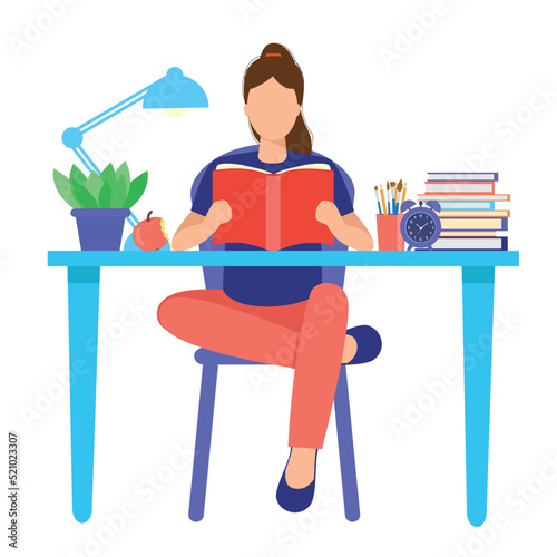 Student reading book. Learning. Back to school. Book lover, cute smiling girl sitting on table reading book. Literature fan, education, stay home concept.