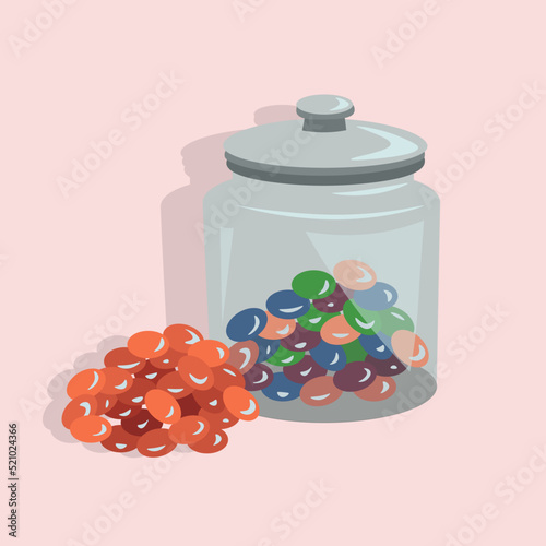 Jar of Colorful Jelly Beans Isolated on Pink