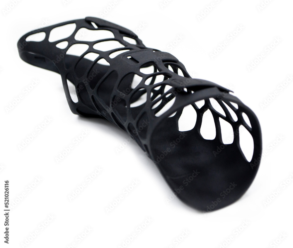 Medical orthopedic plastic prosthesis printed on powder 3D printer isolated on white background