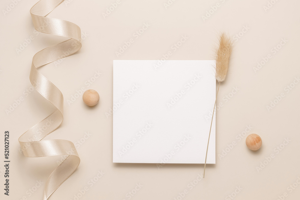 Blank paper card with lagurus grass, minimal aesthetic style. Business brand, social media, logo and invitation template. Flat lay, top view Blank paper card with lagurus grass, minimal aesthetic style. Business brand, social media, logo and invitation template. Flat lay, top view