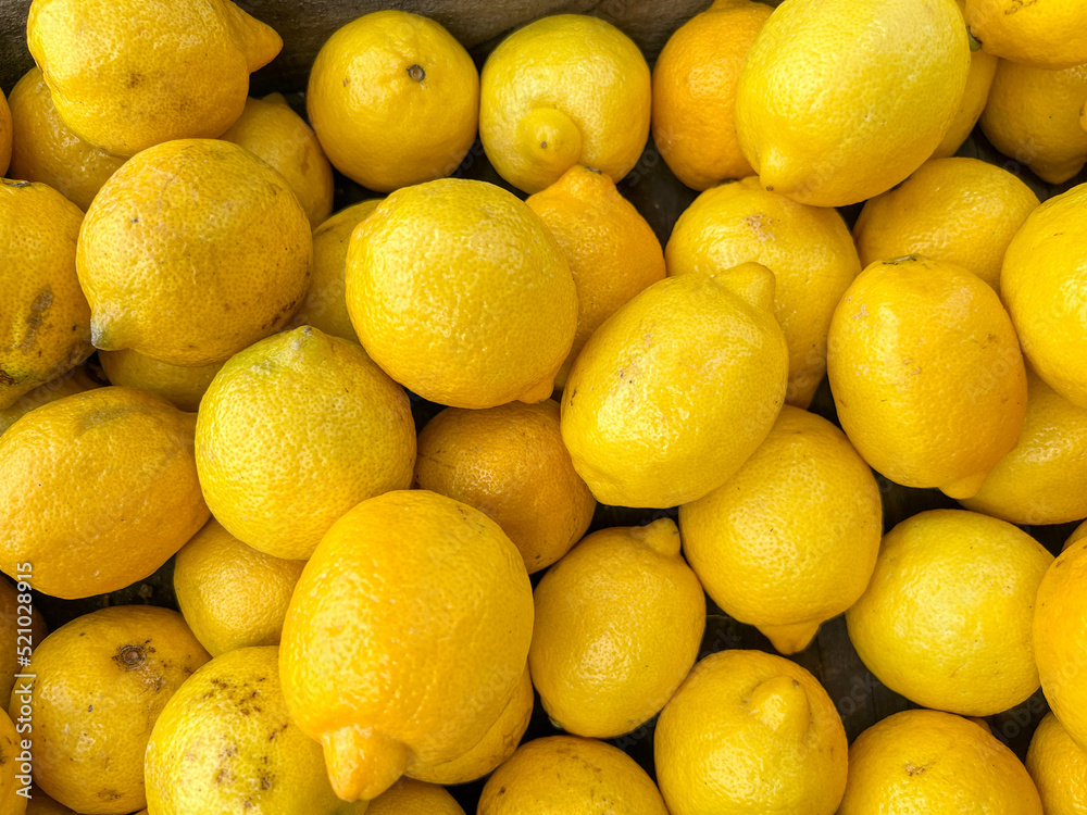 Colorful lemons at a fruit and vegetable stand in Orlando, Florida. Colorful lemons at a fruit and vegetable stand in Orlando, Florida.