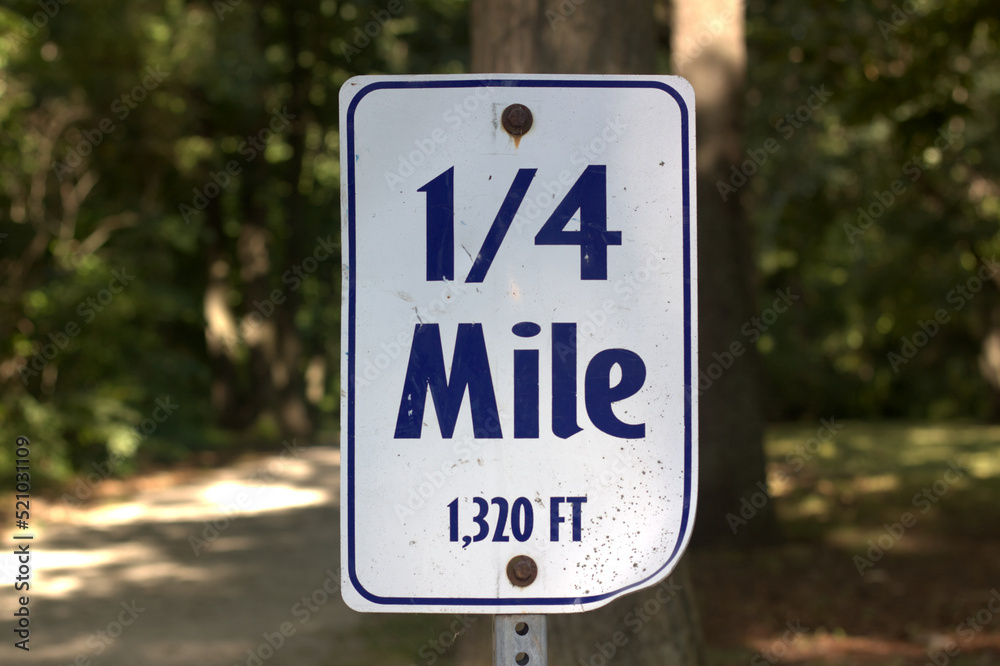 Damaged sign indicating a quarter mile Damaged sign indicating a quarter mile