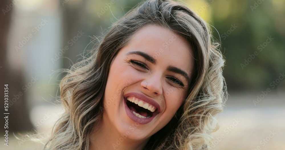 Real laugh and smile of pretty girl looking to camera Real laugh and smile of pretty girl looking to camera
