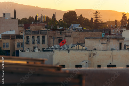 Moroccan flag on the roof of a house in the Medina