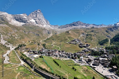 Panoramic view from above the village of Breuil-Cervinia with the Matterhorn in the background. Breuil-Cervinia, Italy - August 2022 photo