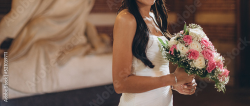 a bride from Latin America and caucasian groom, bridal couple in love, happy wedding day