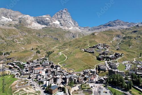 Panoramic view from above the village of Breuil-Cervinia with the Matterhorn in the background. Breuil-Cervinia, Italy - August 2022 photo