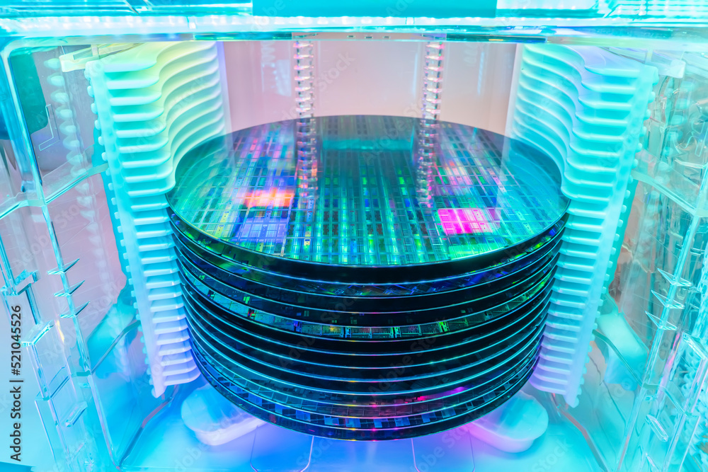 patterned silicon wafers in a universal pod. Electronic circuit designs have been built onto the wafers using micromaching including photolithography - obrazy, fototapety, plakaty 