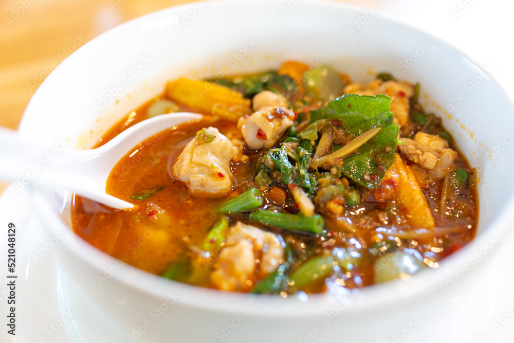Forest curry or jungle curry in a bowl isolated on white, Spicy Thai curry from the forested areas of Thailand. a kind of Thai curry 'Kang-Paa-Kai'. Forest curry or jungle curry in a bowl isolated on white, Spicy Thai curry from the forested areas of Thailand. a kind of Thai curry 'Kang-Paa-Kai'.