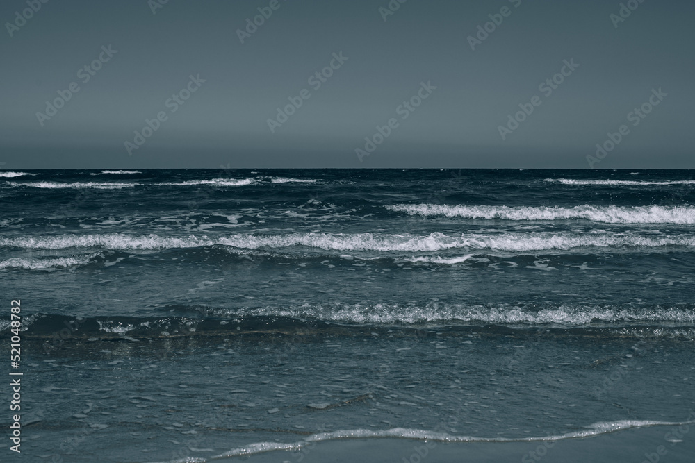 Seashore landscape, waves, sun, horizon, ridges. Seashore landscape, waves, sun, horizon, ridges.