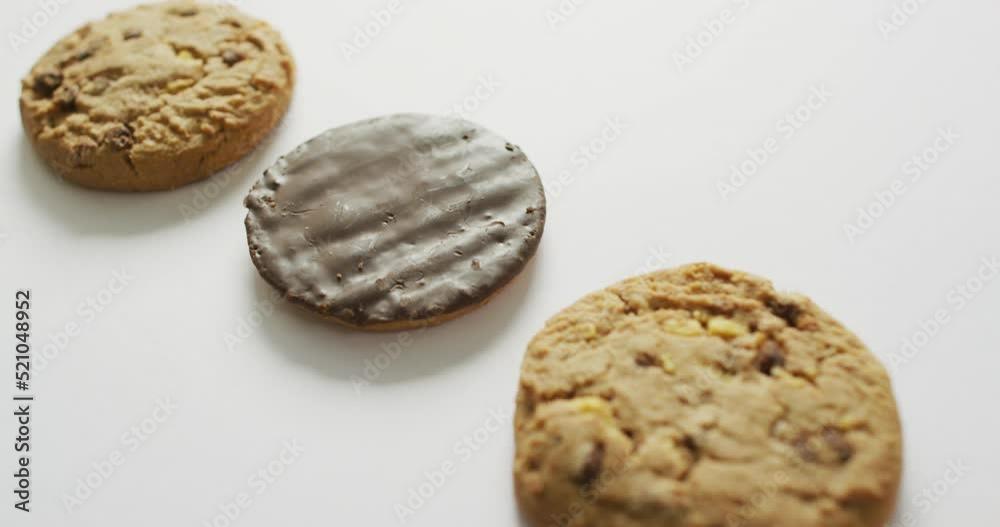 Video of biscuits with chocolate over white background