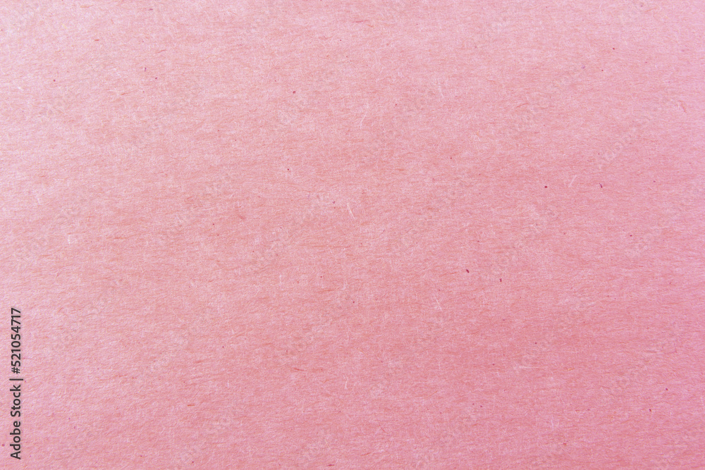 Close-up shot of light pink paper texture pattern for background Close-up shot of light pink paper texture pattern for background