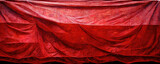 Red curtain with folds as background banner texture