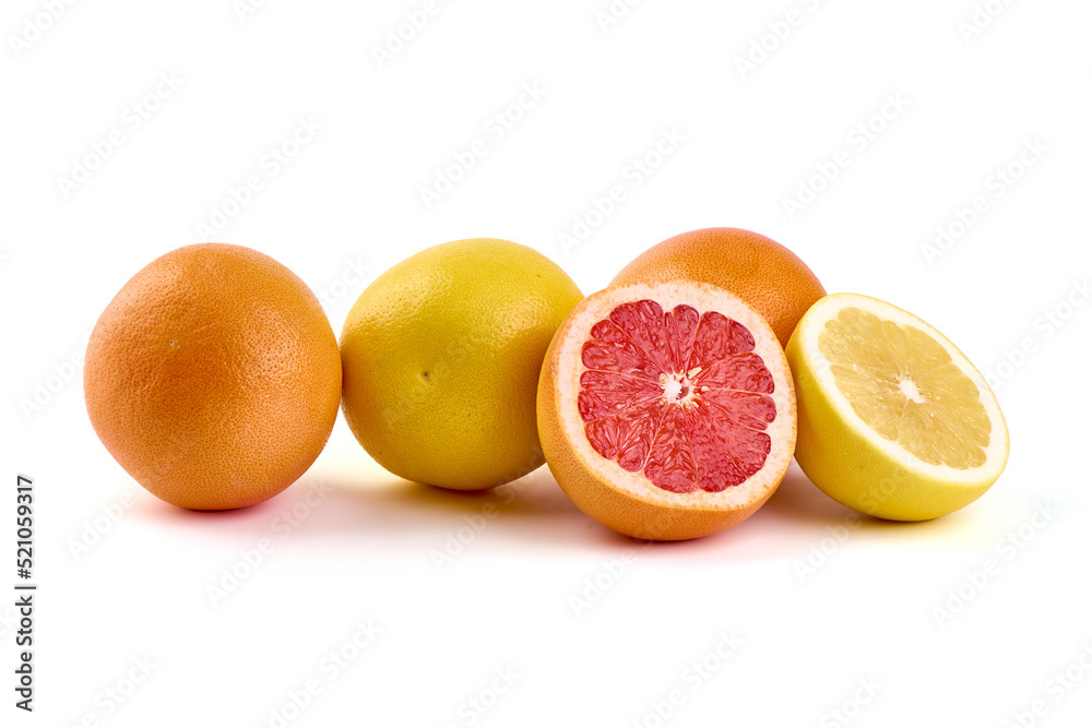 White and pink grapefruits, isolated on white background. White and pink grapefruits, isolated on white background.