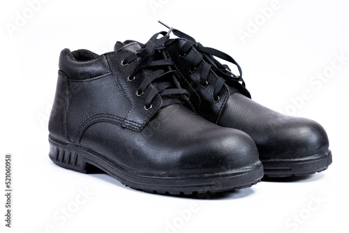 safety shoe black work boots on white background photo