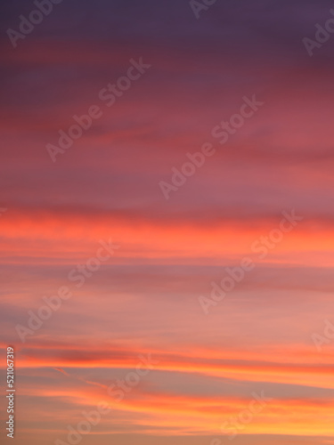Vibrant and Colorful Sunset background. Bright sunset sky, full frame. The sky as a background.