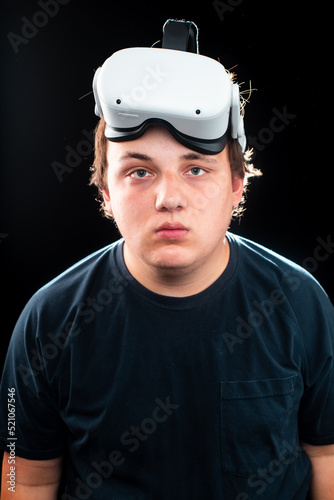 portrait of a man wearing a VR headset