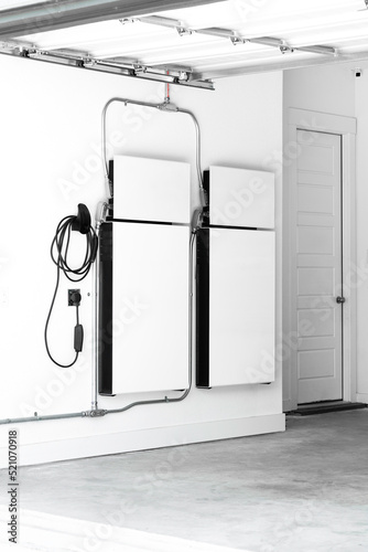 Home Electricity Battery Backup Generators in a Clean Garage with EV Charging Cable