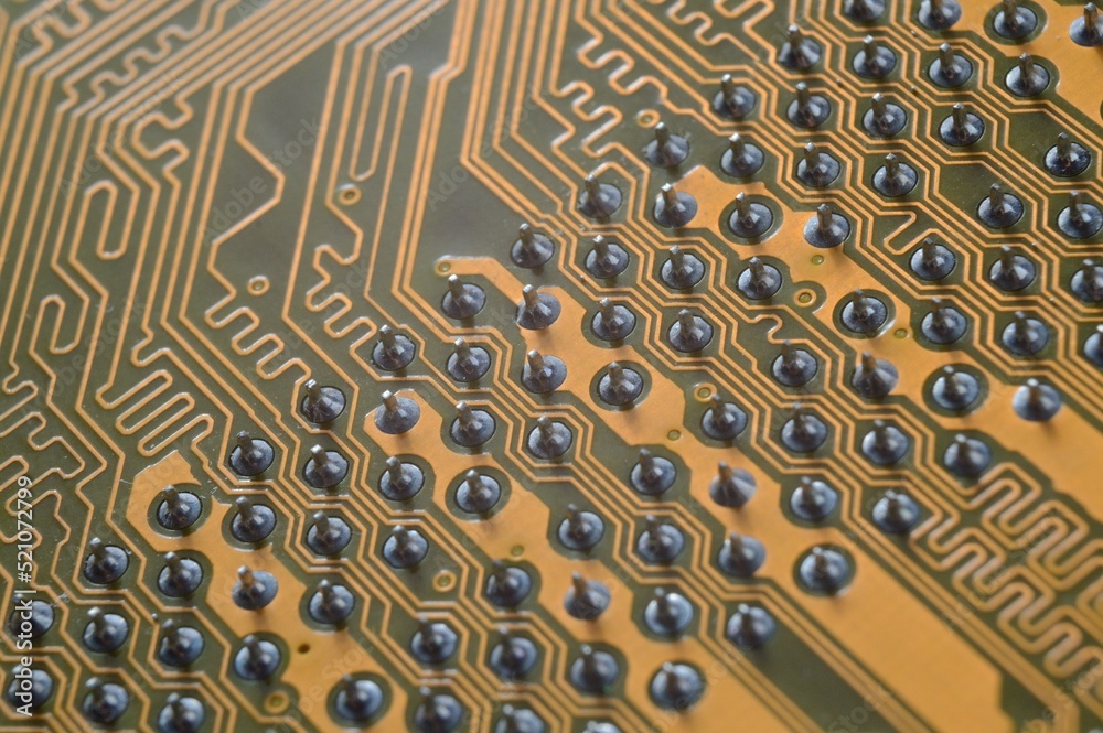 contacts on the surface of the motherboard from the computer. close-up contacts on the surface of the motherboard from the computer. close-up