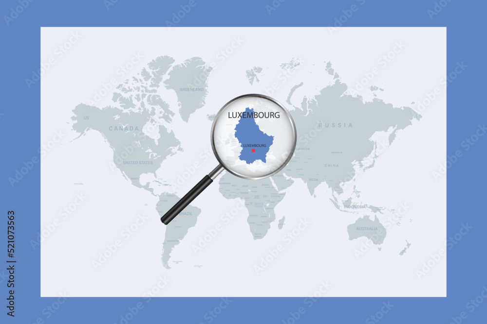 Map of Luxembourg on political world map with magnifying glass