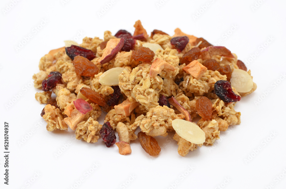 granola muesli with dried berries and fruits on a white background close-up granola muesli with dried berries and fruits on a white background close-up