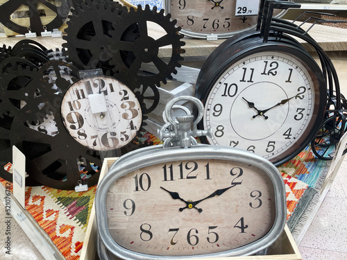 a display with a group of vintage watches, concept of time passing by, antique watches imitation