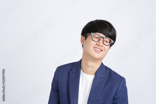 Young Asian Business man looking down and disappointing on white background