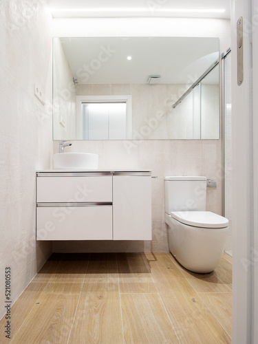 photo of modern small bathroom in light tones