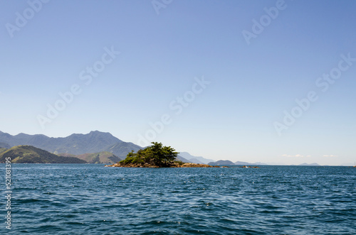 Tropical island in the sea at the coast of Angra dos Reis town, State of Rio de Janeiro, Brazil. Taken with Nikon D5100 18-55 lens, at 24mm, 1/400 f 10 ISO 100. Date: Mar 16, 2014 photo