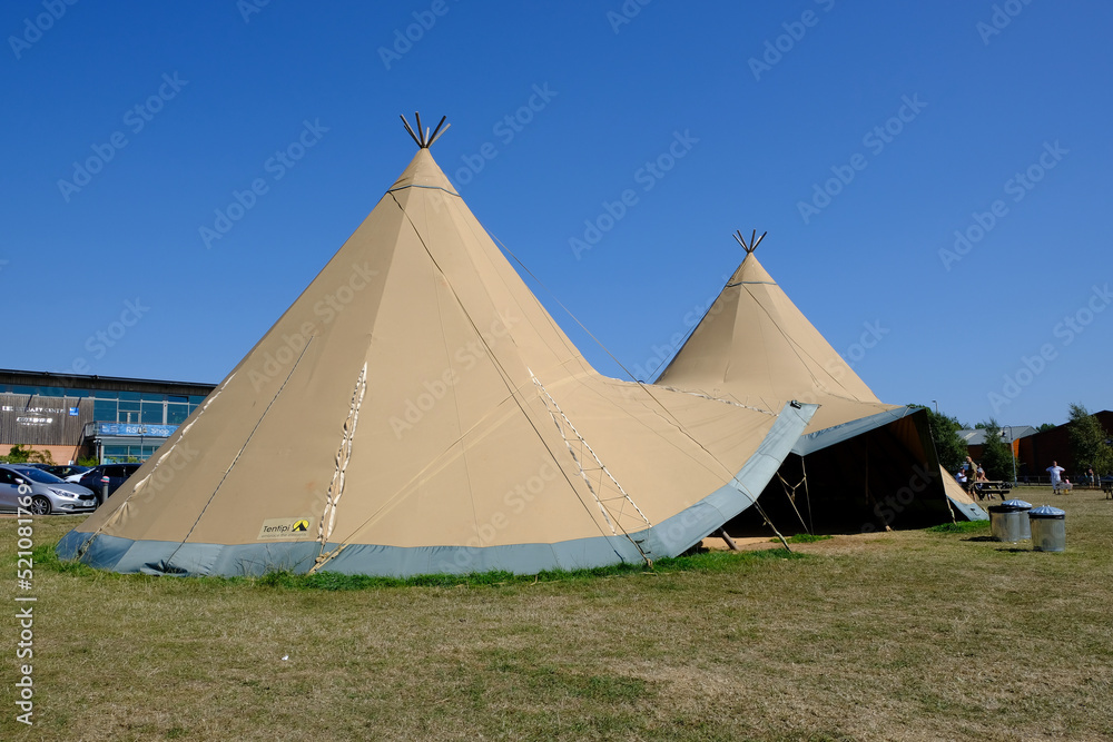 A large Nordic Teepee tent is setup for people to use and enjoy as a picnic spot