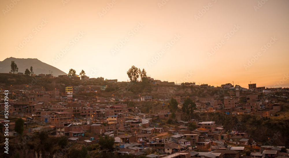 
houses and trees in mountain at dawn, cusco, peru