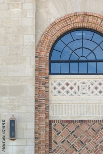 art deco building window with light sconce