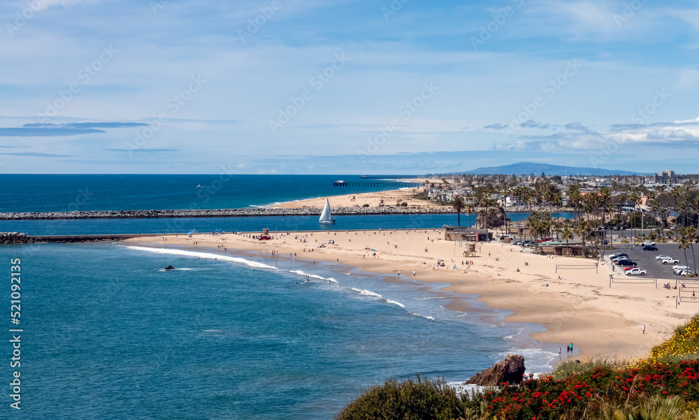 beautiful Newport Beach California coastline view from Corona Del Mar beach on a sunny summer day