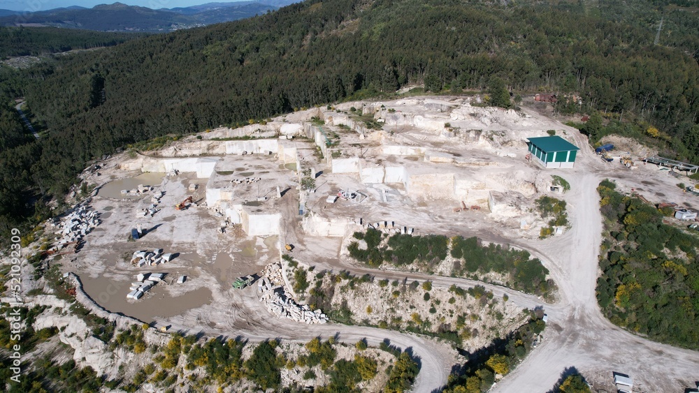aerial photography of stone quarry at sunset