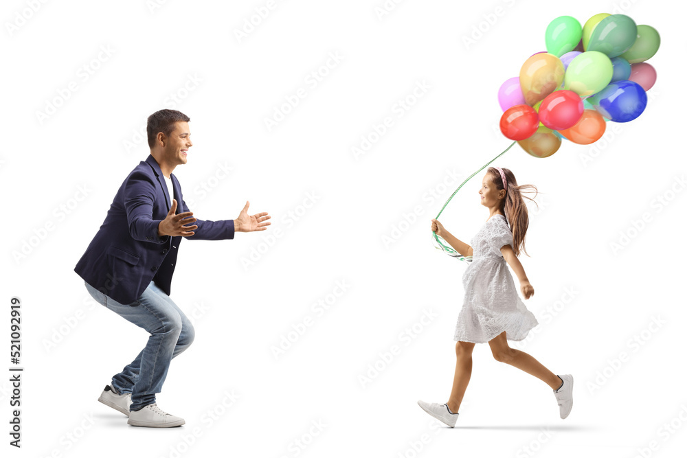 Girl holding balloons and running towards a young man Girl holding balloons and running towards a young man