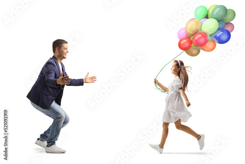 Girl holding balloons and running towards a young man