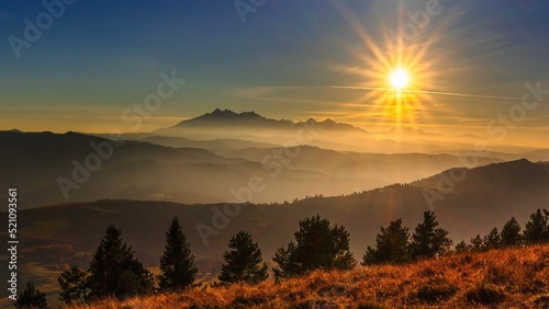 Widok Tatr z Pienin o zachodzie słońca  © Michal45