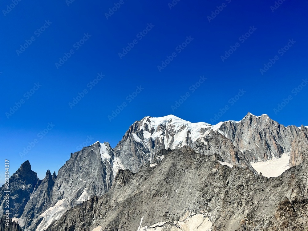 snow covered mountains. View of Mont Blanc in summer. Snowy peaks