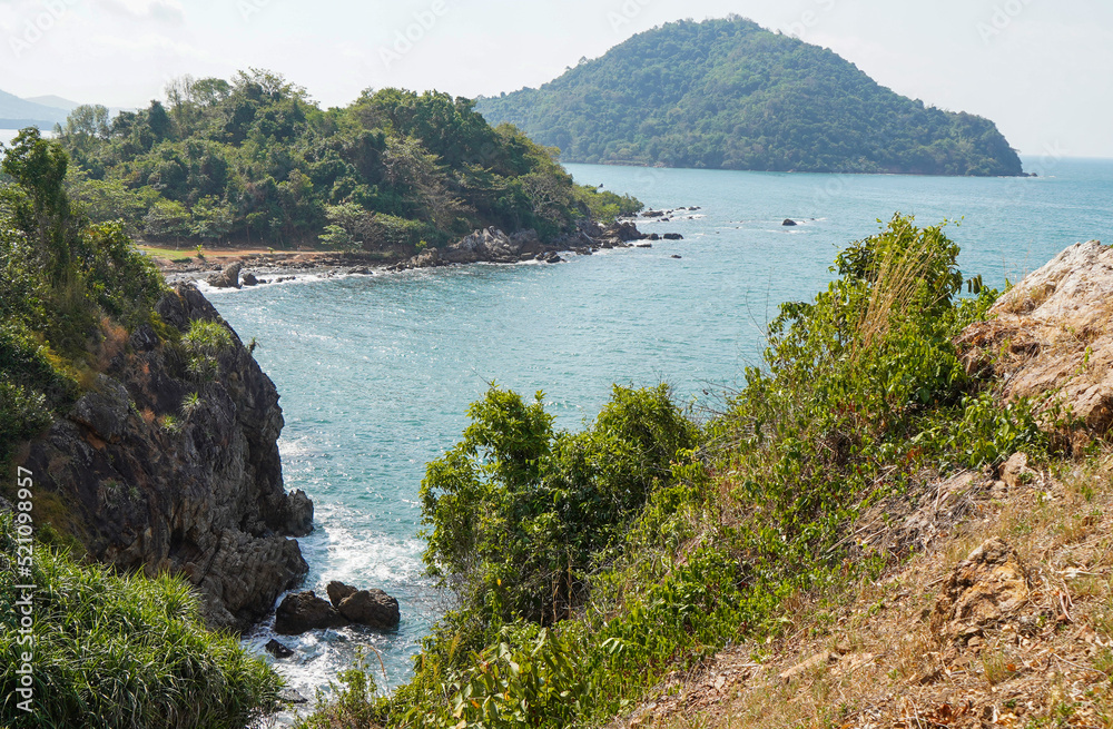 Beautiful view point of tropical sea and island with mountain cliff and rocks in Noen Nangphaya View Point in Chanthaburi, Thailand.
